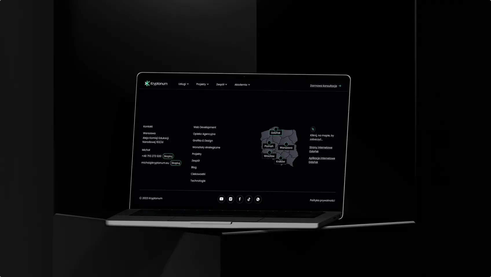 Dark laptop showing the homepage in night mode.