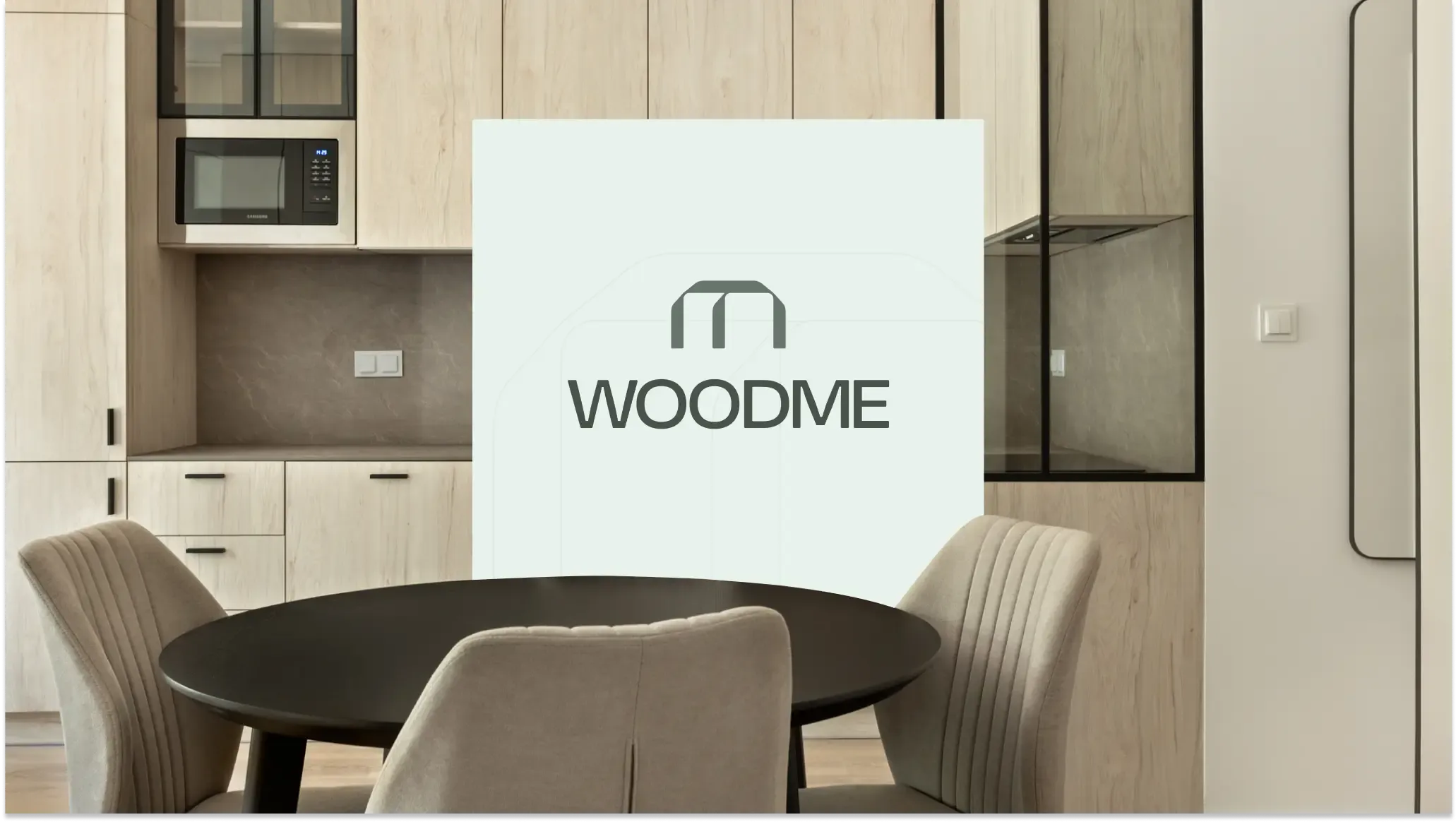 Square panel with the WOODME logo placed on a photo of a modern kitchen in bright, beige tones.